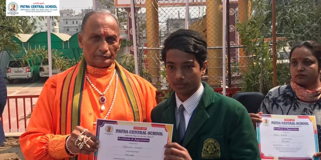 acharyashri sudarshan giving certificates to student